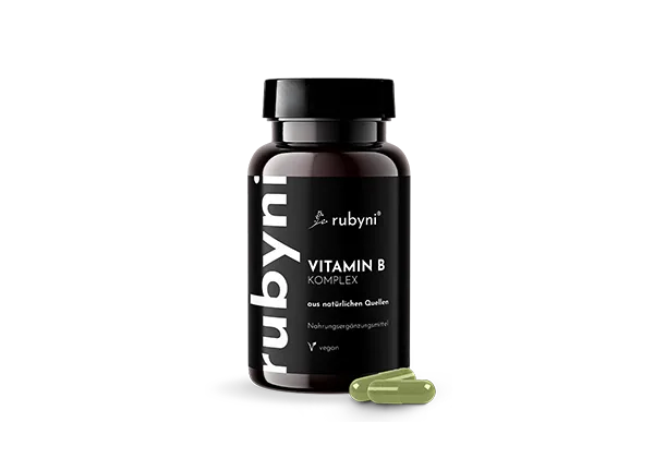 rubyni Vitamin B KOMPLEX – vegan & natürlich Dunkles PET-Fläschchen rubyni Vitamin B KOMPLEX mit zwei hellgrünen Kapseln